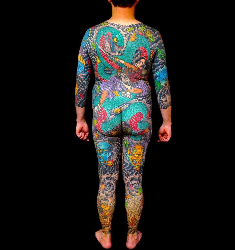 London UK 24th September 2017 A man with a Japanese style body suit  tattoo before shading and colouring has been completed at the 13th London  International Tattoo Convention which took place over